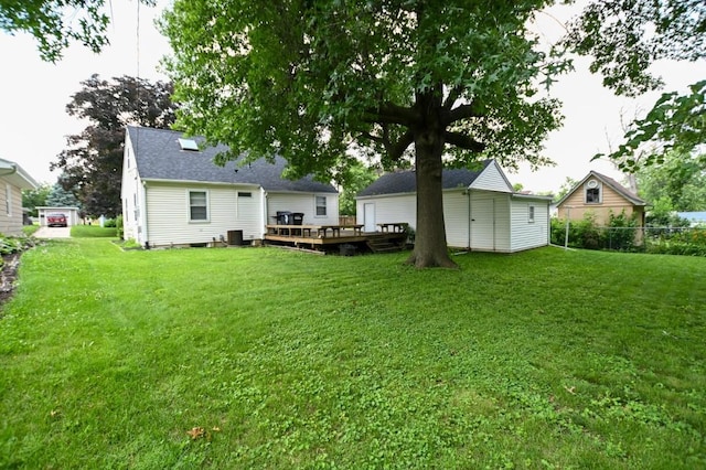 1135 Maplecrest Dr, Marion, IA 52302 - rear view of property with a wooden deck and an outdoor structure