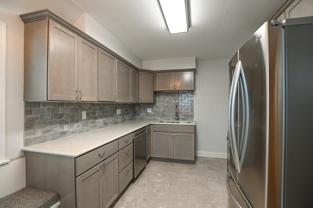 1135 Maplecrest Dr, Marion, IA 52302 - kitchen with appliances with stainless steel finishes, backsplash, and light countertops