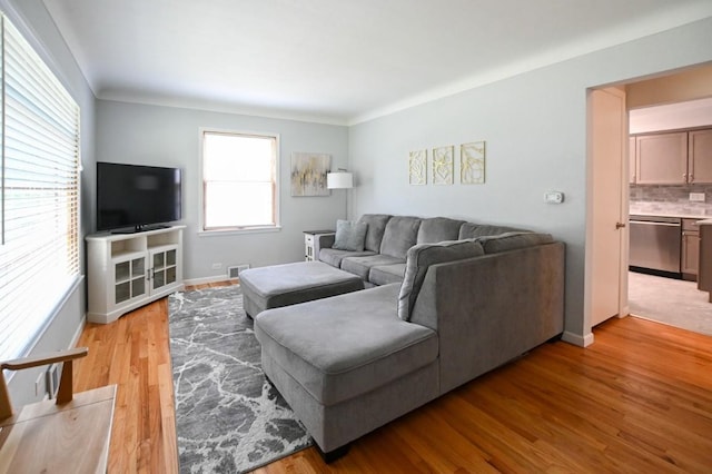 1135 Maplecrest Dr, Marion, IA 52302 - living room with light wood-type flooring and baseboards