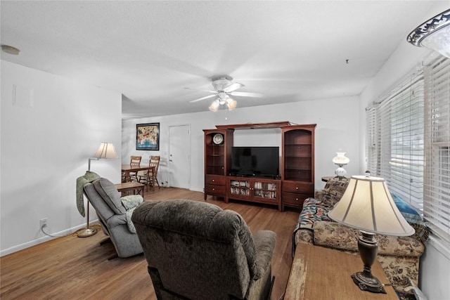 6613 Devonshire Dr NE, Cedar Rapids, IA 52402 - living room with wood finished floors and ceiling fan