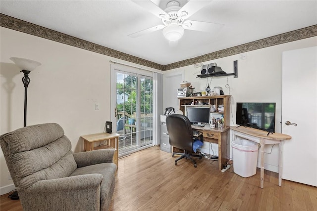 6613 Devonshire Dr NE, Cedar Rapids, IA 52402 - home office with wood finished floors and a ceiling fan