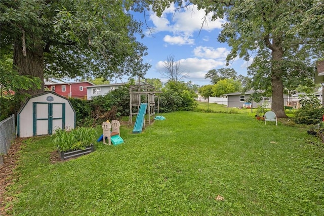 6613 Devonshire Dr NE, Cedar Rapids, IA 52402 - fenced backyard with a shed and a playground
