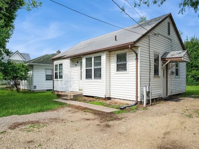 2408 J St SW, Cedar Rapids, IA 52404 - back of property with roof with shingles