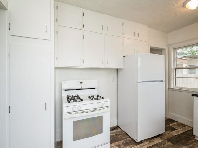 2408 J St SW, Cedar Rapids, IA 52404 - kitchen with white appliances, dark wood-style floors, white cabinetry, and a textured ceiling