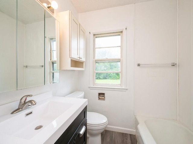 2408 J St SW, Cedar Rapids, IA 52404 - full bathroom featuring vanity and wood finished floors