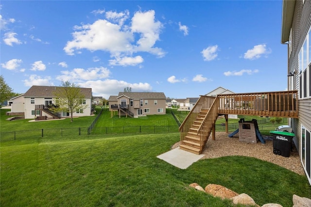 2455 Bridlewood Ct, Marion, IA 52302 - fenced backyard featuring stairway, a residential view, and a deck