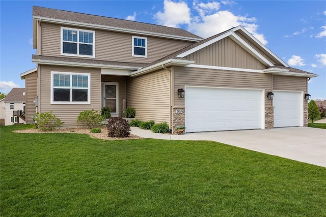 2455 Bridlewood Ct, Marion, IA 52302 - view of front of house featuring concrete driveway, a garage, a front yard, roof with shingles, and stone siding