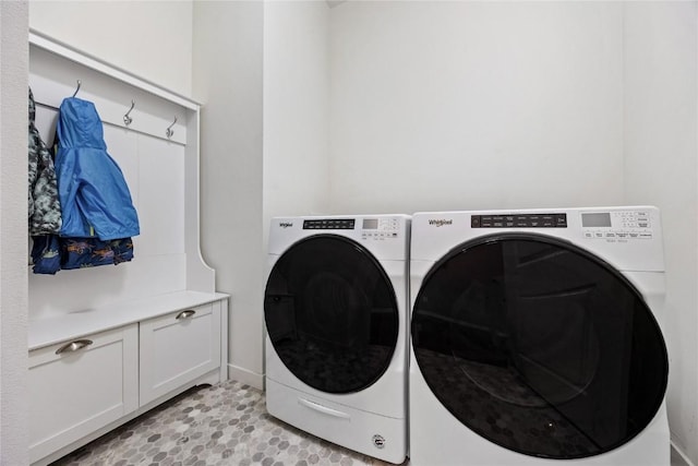 2455 Bridlewood Ct, Marion, IA 52302 - washroom with washer and dryer and cabinet space