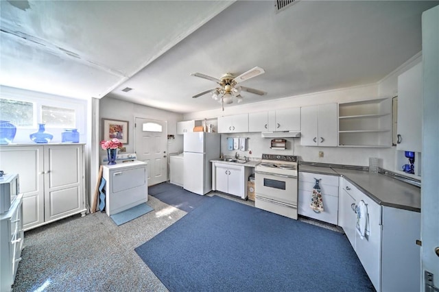1011 Regent St NE, Cedar Rapids, IA 52402 - kitchen featuring white appliances, under cabinet range hood, open shelves, washer / dryer, and a ceiling fan