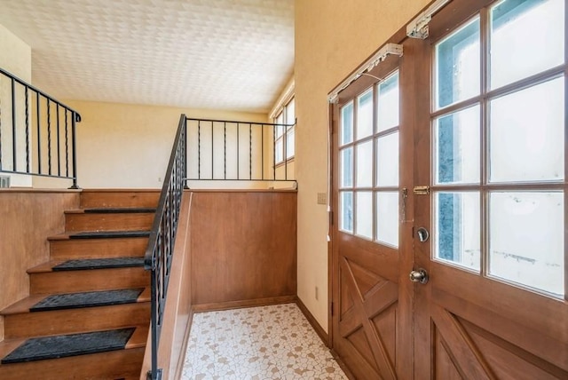 2029 Knollshire Rd NE, Cedar Rapids, IA 52402 - doorway with stairs and light flooring