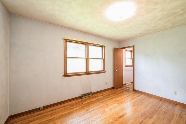 2029 Knollshire Rd NE, Cedar Rapids, IA 52402 - spare room featuring light wood-style floors