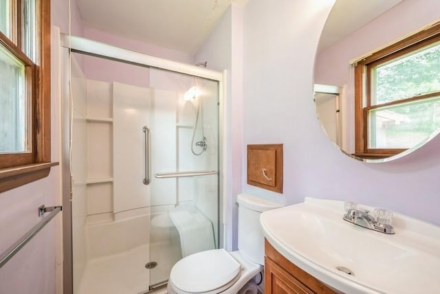 2029 Knollshire Rd NE, Cedar Rapids, IA 52402 - bathroom featuring vanity and a stall shower