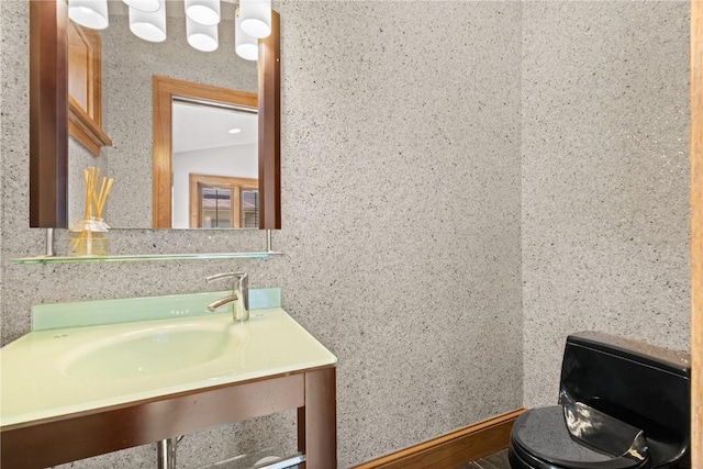 2021 Bever Ave SE, Cedar Rapids, IA 52403 - bathroom with toilet and a sink