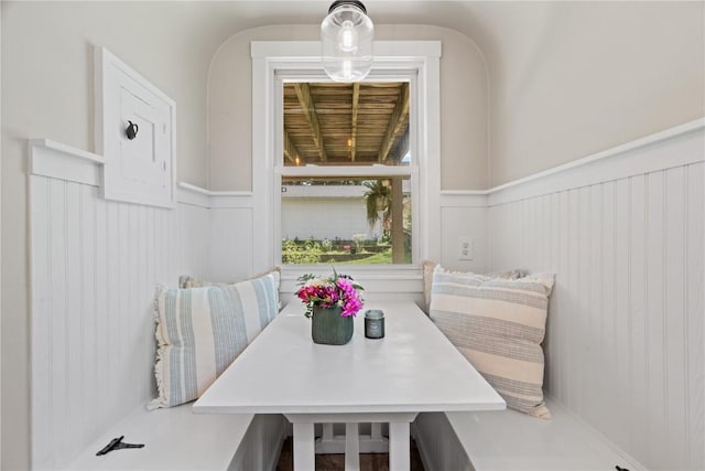 2021 Bever Ave SE, Cedar Rapids, IA 52403 - dining area featuring a wainscoted wall, a decorative wall, and breakfast area