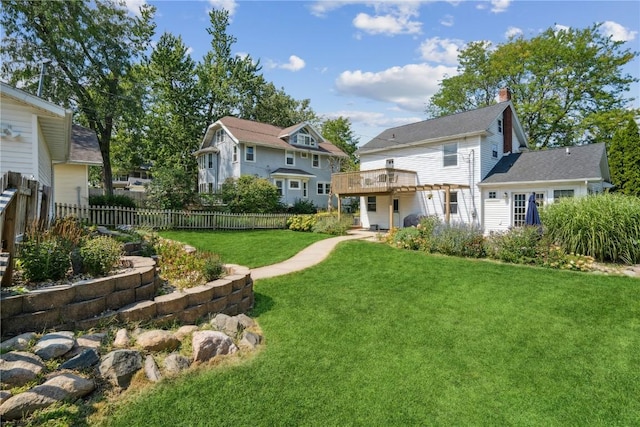 2021 Bever Ave SE, Cedar Rapids, IA 52403 - rear view of house featuring a chimney and a wooden deck