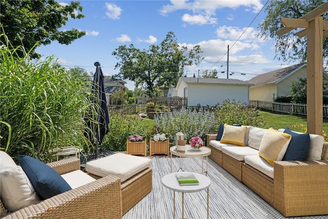 2021 Bever Ave SE, Cedar Rapids, IA 52403 - fenced backyard featuring an outdoor hangout area