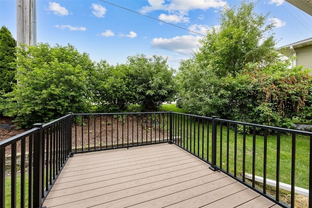 1458 Tower Ln NE Unit 12, Cedar Rapids, IA 52402 - wooden terrace with a yard