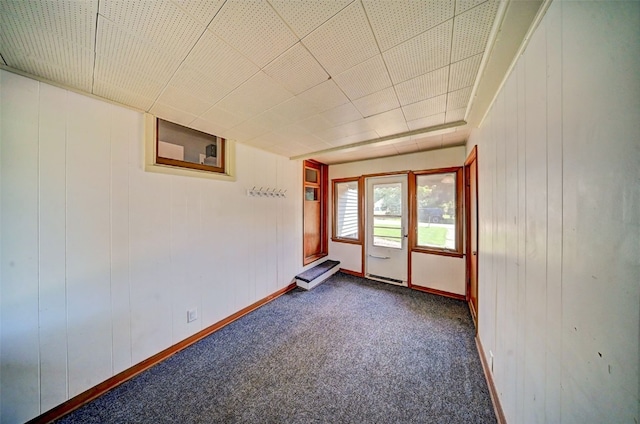 336 20th St NW, Cedar Rapids, IA 52405 - unfurnished room featuring dark colored carpet and baseboards
