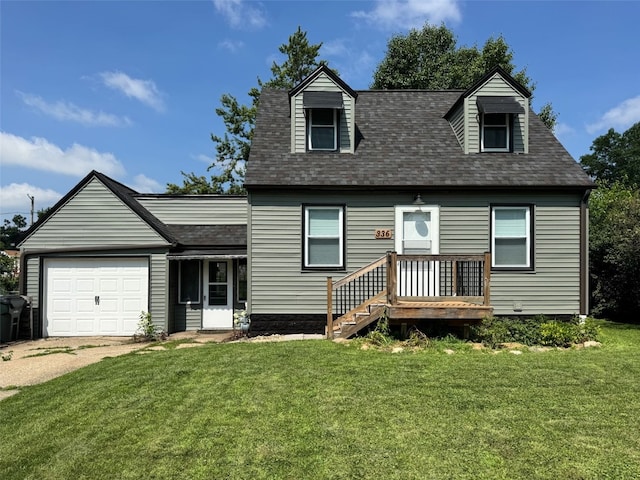 336 20th St NW, Cedar Rapids, IA 52405 - cape cod-style house featuring an attached garage, roof with shingles, a front lawn, and driveway