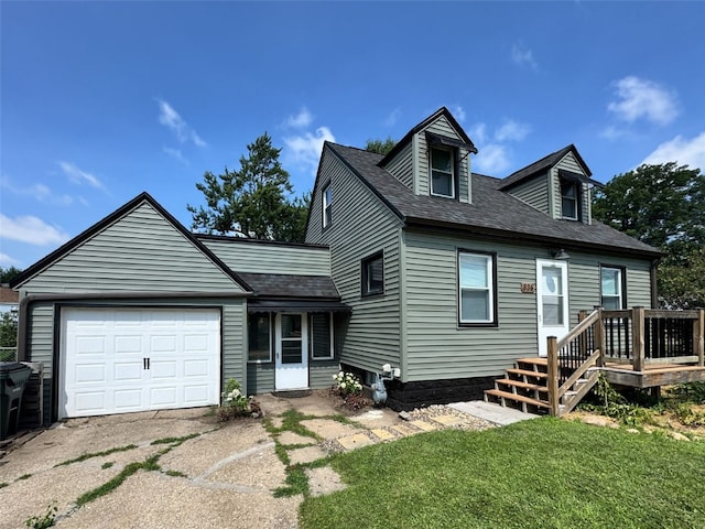 336 20th St NW, Cedar Rapids, IA 52405 - view of front of home with an attached garage, driveway, a shingled roof, and a front lawn