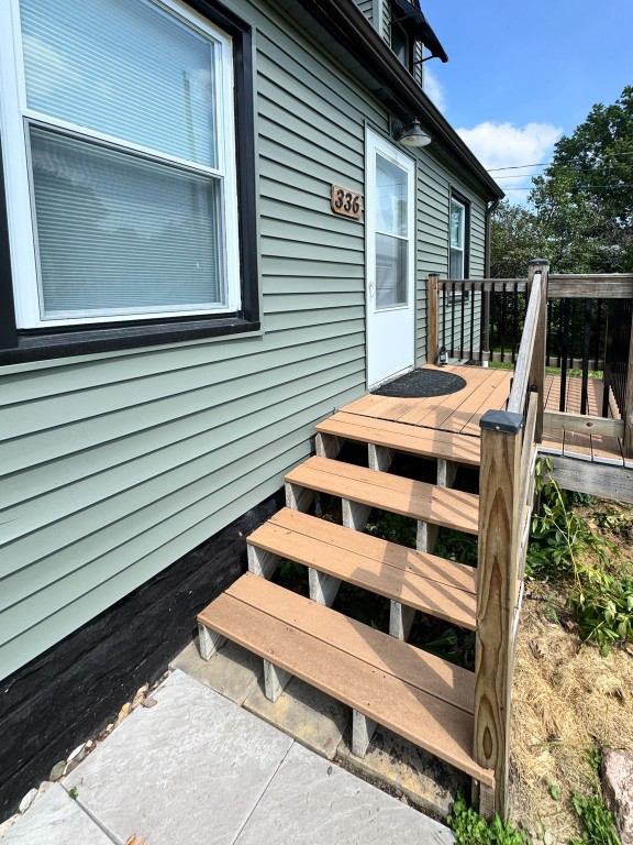 336 20th St NW, Cedar Rapids, IA 52405 - property entrance with a deck