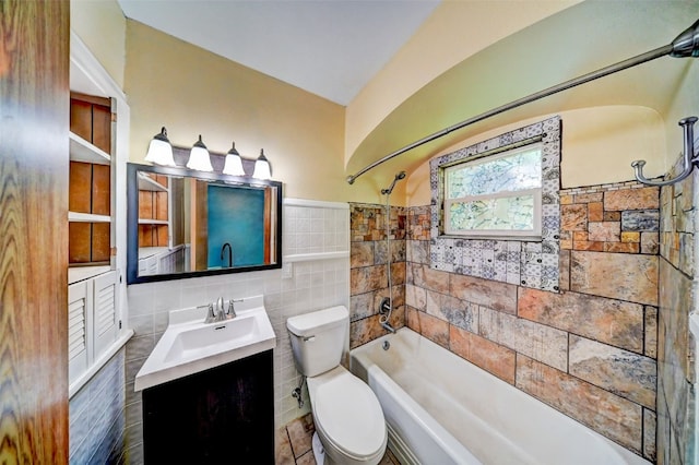 336 20th St NW, Cedar Rapids, IA 52405 - full bathroom with tile walls, shower / washtub combination, and vanity