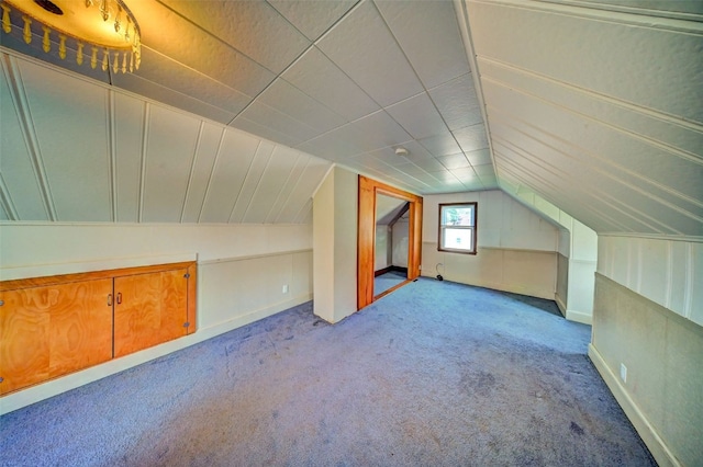 336 20th St NW, Cedar Rapids, IA 52405 - bonus room featuring carpet and lofted ceiling