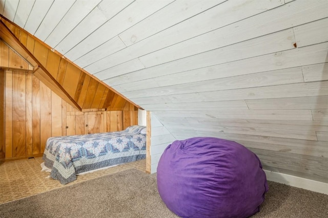 2000 Hamilton St SW, Cedar Rapids, IA 52404 - carpeted bedroom featuring wooden walls, lofted ceiling, and wooden ceiling