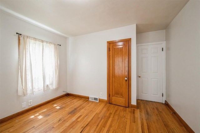 2000 Hamilton St SW, Cedar Rapids, IA 52404 - unfurnished room with light wood-style flooring and baseboards