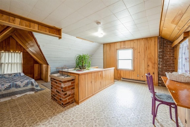 2000 Hamilton St SW, Cedar Rapids, IA 52404 - bedroom with baseboard heating, lofted ceiling, and wood walls