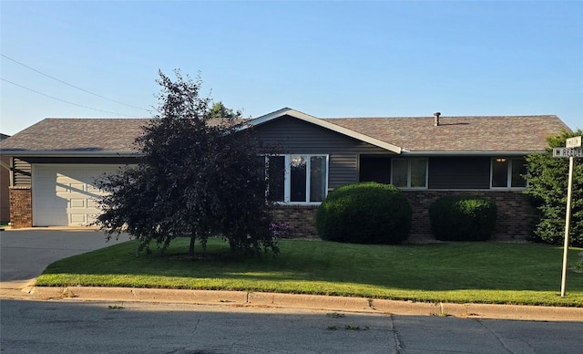 300 W Reeder, Mechanicsville, IA 52306 - ranch-style home with brick siding, concrete driveway, and a front yard