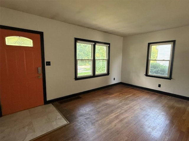 1839 K Ave NE, Cedar Rapids, IA 52402 - entryway with hardwood / wood-style floors and baseboards
