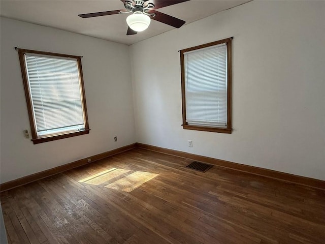 1839 K Ave NE, Cedar Rapids, IA 52402 - spare room with wood-type flooring and a ceiling fan
