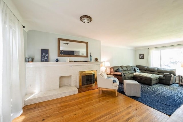 1935 1st Ave SW, Cedar Rapids, IA 52405 - living room with wood finished floors and a fireplace