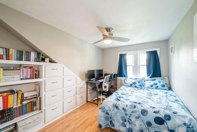 1935 1st Ave SW, Cedar Rapids, IA 52405 - bedroom with light wood finished floors and ceiling fan