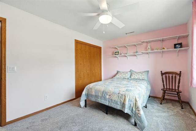 3060 Wilson Ave SW Unit 7, Cedar Rapids, IA 52404 - bedroom with carpet floors, a closet, and ceiling fan