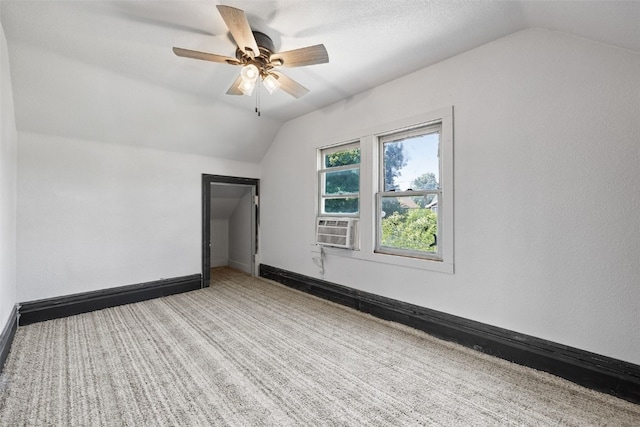 1818 Park Ave SE, Cedar Rapids, IA 52403 - additional living space featuring vaulted ceiling, a ceiling fan, and carpet floors
