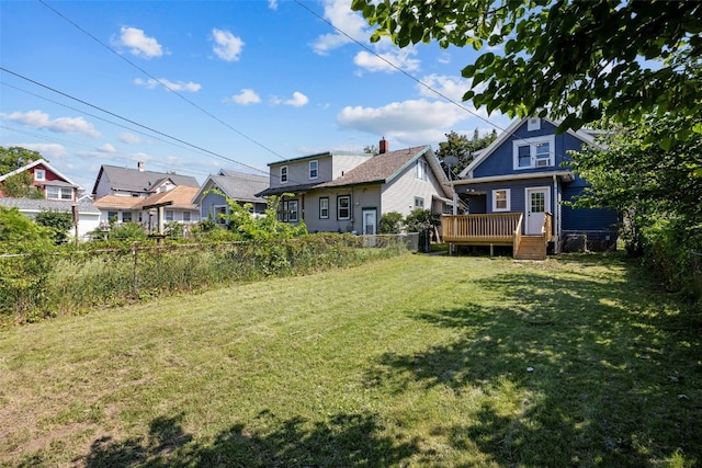 1818 Park Ave SE, Cedar Rapids, IA 52403 - view of yard with a wooden deck and a residential view