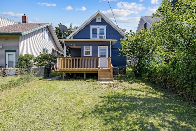 1818 Park Ave SE, Cedar Rapids, IA 52403 - rear view of house featuring a fenced backyard and a wooden deck