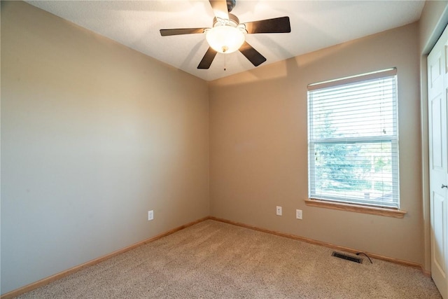 6045 Ridgewood Meadows Ln NE, Cedar Rapids, IA 52411 - carpeted spare room featuring baseboards and ceiling fan