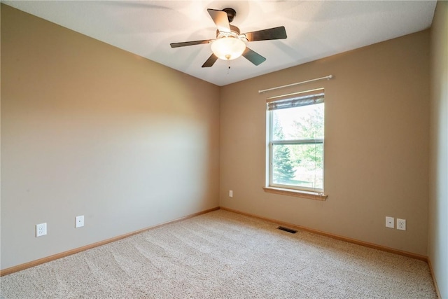 6045 Ridgewood Meadows Ln NE, Cedar Rapids, IA 52411 - spare room with carpet flooring and a ceiling fan