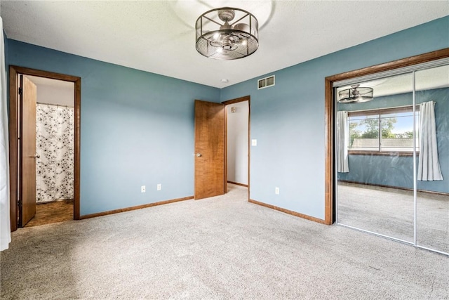 4185 Richland Dr, Cedar Rapids, IA 52405 - unfurnished bedroom with carpet and a closet