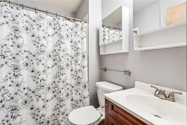 4185 Richland Dr, Cedar Rapids, IA 52405 - bathroom with a textured ceiling, vanity, and curtained shower