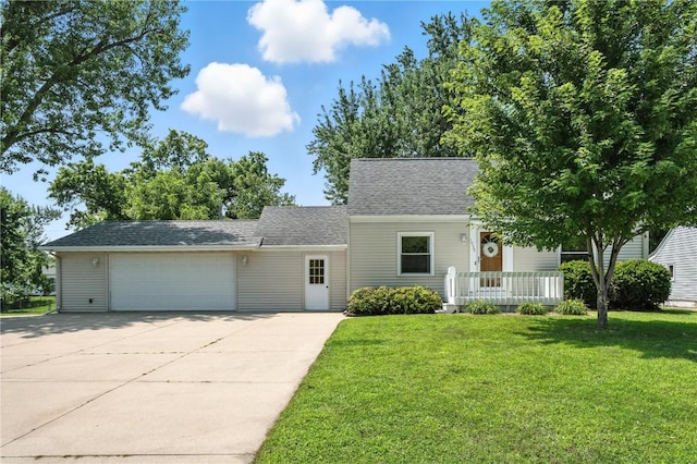 1039 27th St NE, Cedar Rapids, IA 52214 - view of front facade featuring driveway, roof with shingles, a front yard, and an attached garage