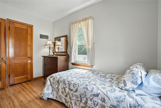 1039 27th St NE, Cedar Rapids, IA 52214 - bedroom with light wood-type flooring and baseboards
