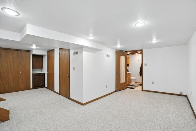 1039 27th St NE, Cedar Rapids, IA 52214 - finished basement featuring baseboards and carpet flooring