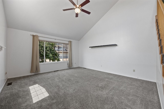 1167 74th St NE, Cedar Rapids, IA 52402 - carpeted empty room with a ceiling fan and high vaulted ceiling