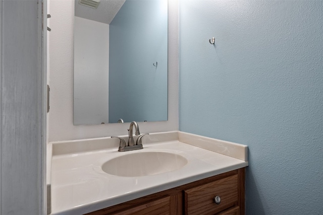 1167 74th St NE, Cedar Rapids, IA 52402 - bathroom featuring vanity