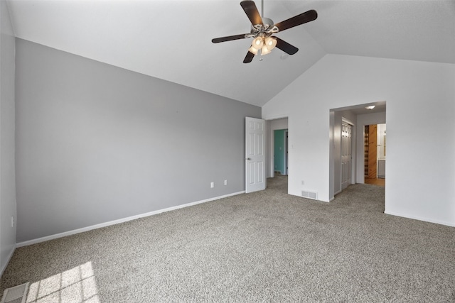1167 74th St NE, Cedar Rapids, IA 52402 - unfurnished bedroom with carpet floors, high vaulted ceiling, and a ceiling fan