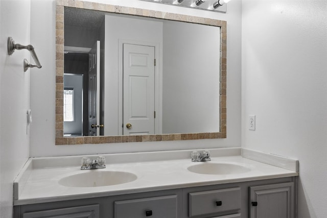 1167 74th St NE, Cedar Rapids, IA 52402 - bathroom featuring double vanity